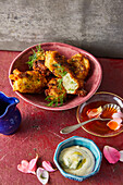  Cod fritters with homemade rose harissa oil and dill mayo 