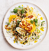 Halloumi and oranges on barley salad