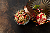 Olives in Persian walnut sauce with pomegranate seeds