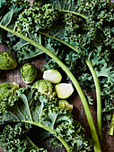 Kale and Brussels sprouts on a wooden base