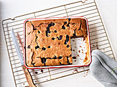Banana and blueberry cake in a casserole dish