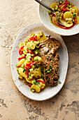 Crispy fish with vegetable and potato salad