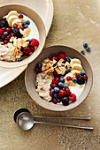 Vanilla porridge with berry jelly and almond slivers
