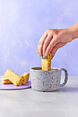 Dunker biscuit dipped in hot chocolate