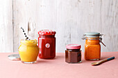 Various colourful jams and fruit spreads