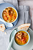 Lentil dal with fried onions and flatbread