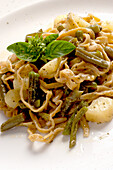 Farro tagliatelline with pesto, beans and potatoes