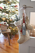 Christmas decorations Home-sewn Christmas stocking on door handle