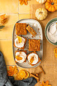 Vegan pumpkin cake with orange cream