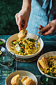 Yellow vegetable stew with bread