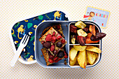 Porridge slices with oven vegetables and potato wedges