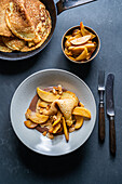 Pancakes with Calvados apples and almonds