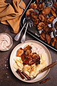 Ricotta dumplings with chocolate skyr and baked plums