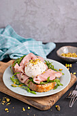 Sandwich with rocket, mortadella and burrata