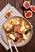 Gnocchi with camembert, ham and figs