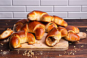 Yeast croissants with poppy seed and nut filling