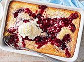 Juicy spoon cake with raspberries and vanilla ice cream