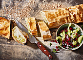 Cabbage strudel with cucumber salad