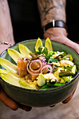 Spring bowl with salmon, onions and asparagus