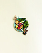 Still life with vegetables, pulses, herbs and spices