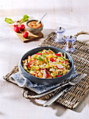 Spaetzle salad with mountain cheese and radishes