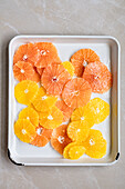 Slices of orange and pink grapefruit