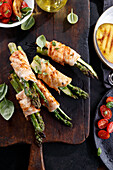 Grilled chicken rolls with green asparagus