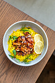 Lemon and garlic chicken with saffron rice