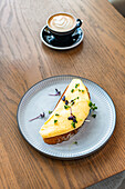 Omelette on sourdough bread with sprouts