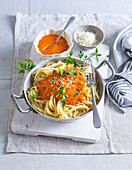 Spaghetti with tomato and cream sauce