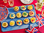 Cupcakes with royal and letter decorations