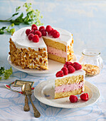 Almond tart with raspberries and whipped cream