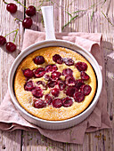 Cherry clafoutis in a casserole dish