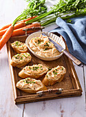 Carrot spread with horseradish on a baguette