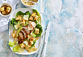 Chicken Caesar salad with croutons and parmesan