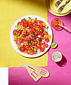 Tomato and lime salad with crispy ginger, chili and garlic