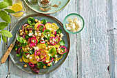 Potato salad with feta, chickpeas and red onions