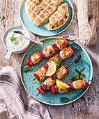 Chicken and vegetable skewers with tzatziki