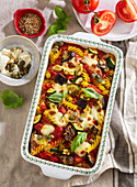 Pasta casserole with vegetables and mozzarella