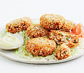 Crispy sushi salmon patties with dip