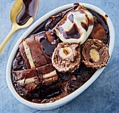 Nutella chocolate pudding with cream and nut pralines