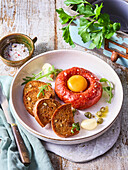 Beef tartare with egg, capers and toasted bread