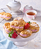 Eclairs with strawberry cream