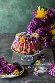 Blueberry bundt cake with edible flowers