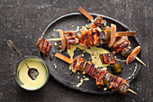 Grilled beef fillet skewers with mustard cream