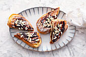 Grilled poor knights with plum jam and almonds