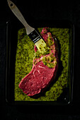 Marinate rump steak with herb marinade