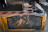 Fresco on ancient Roman food stand, Pompeii, Italy