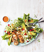 Peri Peri chicken zoodle salad with raspberries