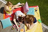 Teenage Girls Hanging Out in Garden, Elevated View